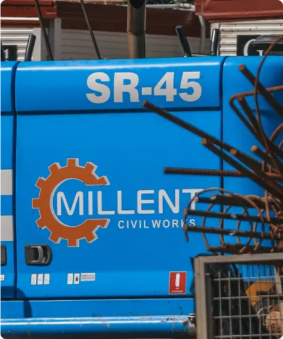 Close-up of a blue Soilmec SR-45 drilling rig with the Millent Civil Works logo