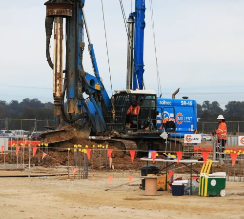 Side profile of a blue Millent Soilmec SR-45 rotary drilling rig